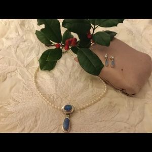 Opal pendant on seed pearls with opal earrings.
